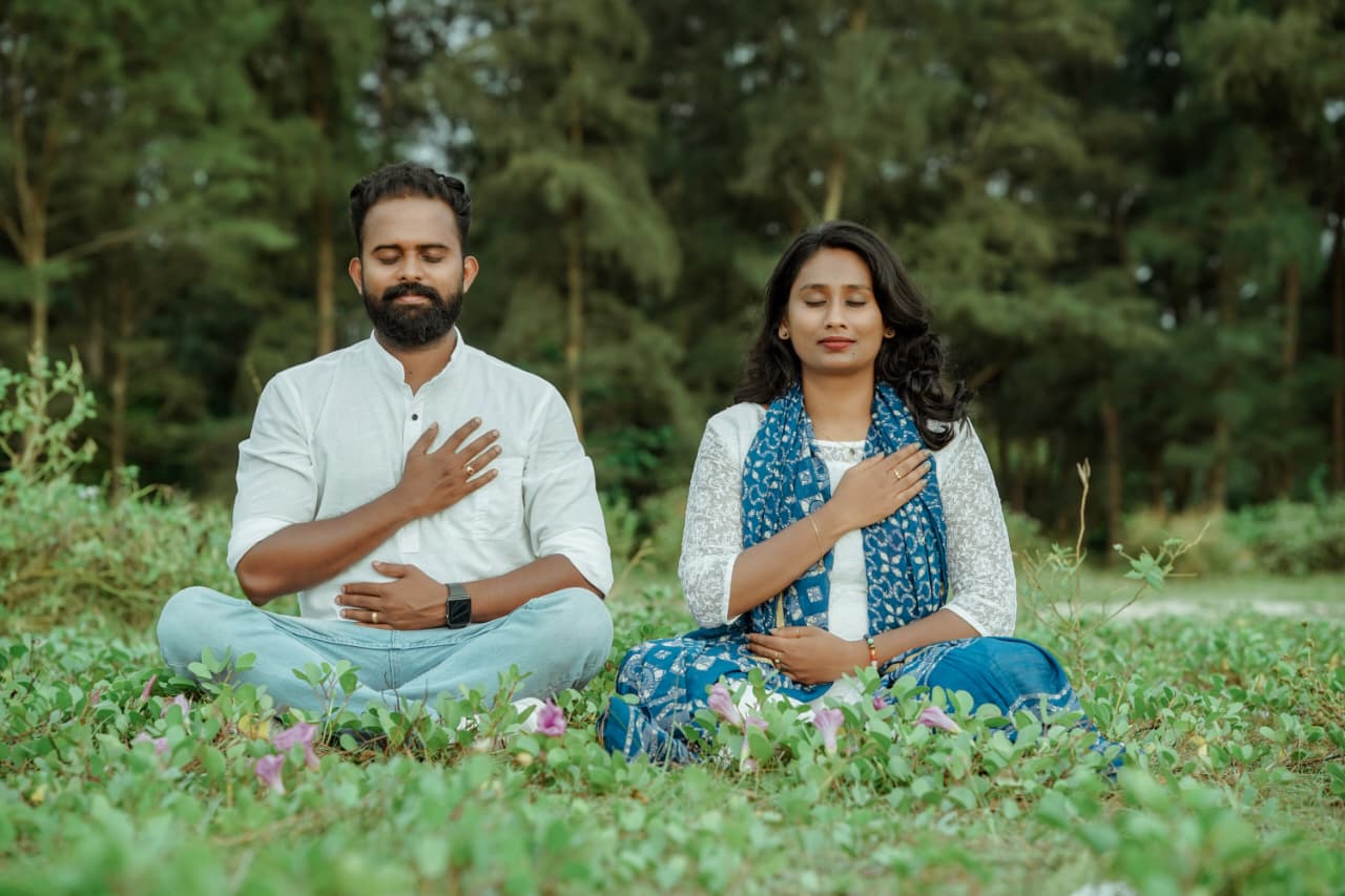 Vishnu Chakrapani & Sajitha Vishnu meditating in nature
